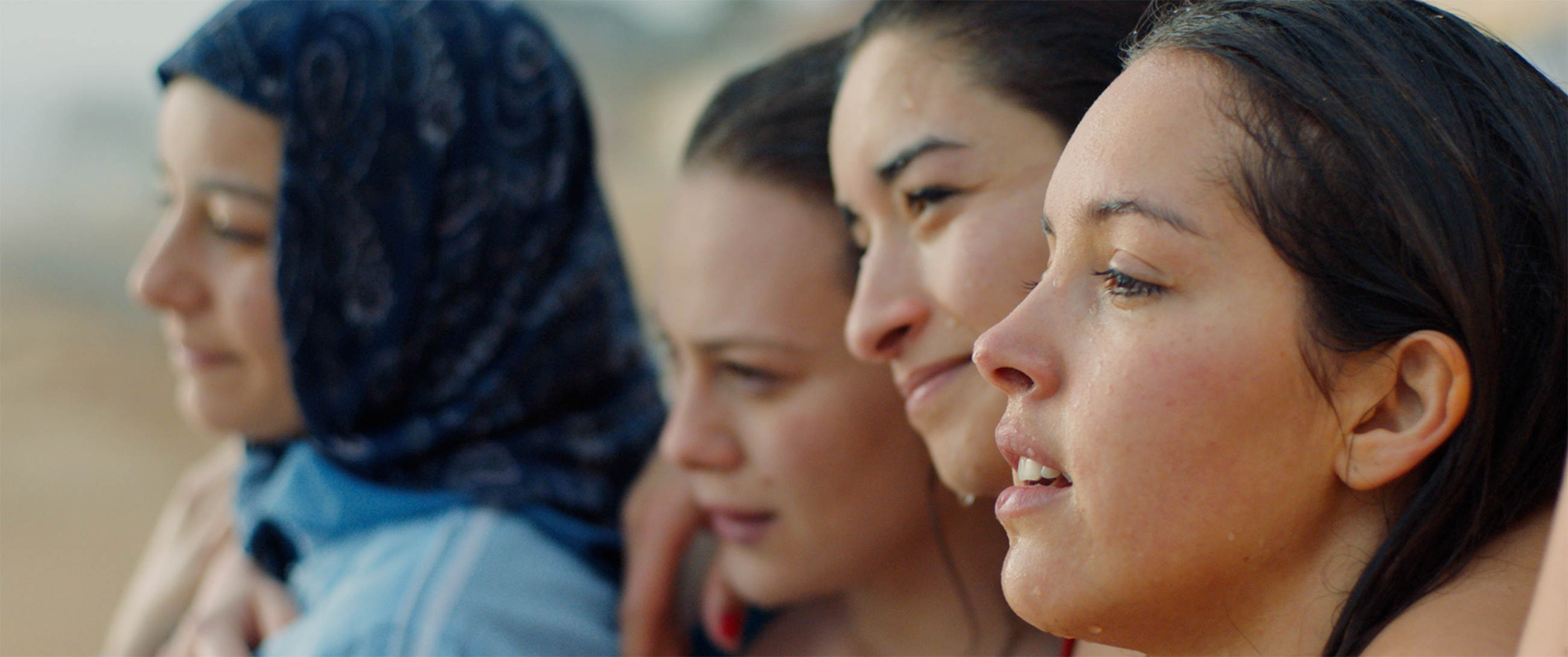 Still from the film Papicha showing four women