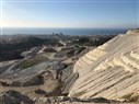 Koura’s Land: From Fertile Resource to Raw Material for Cement Factories