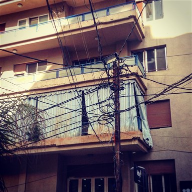 [Electricity pole in Hamra. Photo by Abi Weaver, 2016]