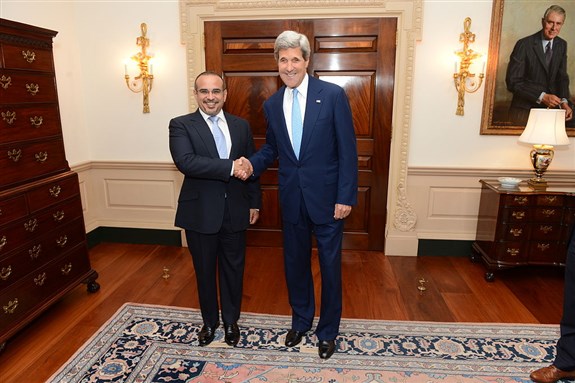 [ U.S. Secretary of State John Kerry shakes hands with Bahraini Crown Prince Salman bin Hamad Al-Khalifa, Washington, D.C., on 6 June 2013. Image from Wikimedia.org.]
