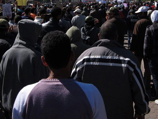 [9,999 people at an uprising. Image by Rheim Alkadhi]