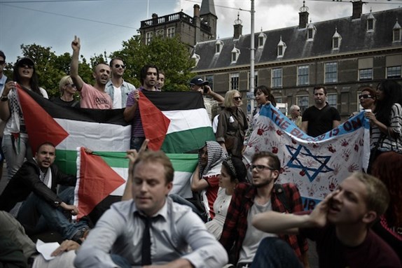 [Protesters outside the Israeli Embassy in The Hague.]