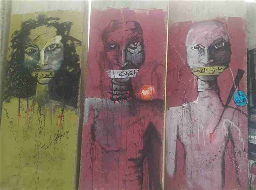 [Graffiti on the wall erected by Lebanese government around the Office of the Prime Minister to prevent protesters from reaching it. Artists took to spraying, drawing, and painting various artwork critiquing the status quo. In this mural, various political parties are represented as silencing the people. Photo by Joelle Boutros]