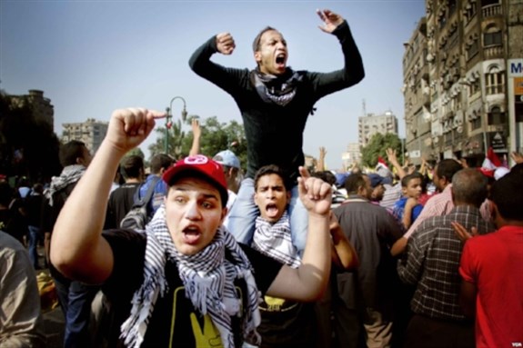 Protestors on the streets of Cairo, October 2013. (Photo: Voice if America via Wikimedia Commons)