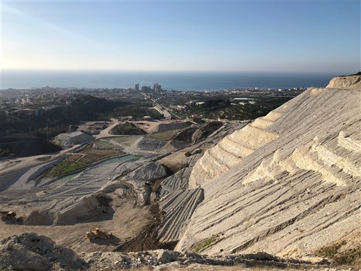 Cement's quarries overlooking Koura's cement factories (Credit: Public Works)
