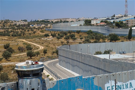 Israeli West Bank barrier, via Shutterstock
