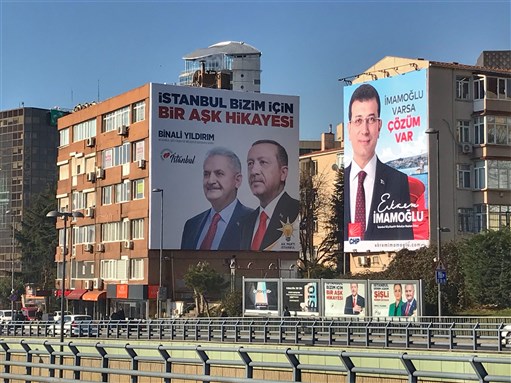A poster for Turkey's President Tayyip Erdogan and Binali Yıldırım and Ekrem Imamoglu election campaign in Istanbul, Turkey on 5 March 2019, via Shutterstock