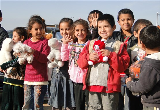 Yazidi children, via Wikimedia Commons