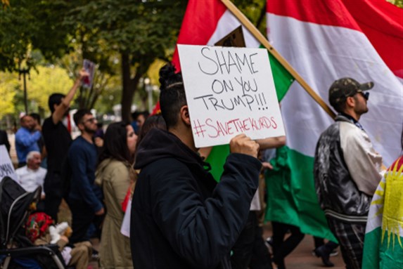 Washington, DC - 12 October 2019: Pro Kurdish government supporters demonstrate their anger at President Trumps decisions to withdraw support for their cause and allow Turkish forces to invade Syria. Image via Shutterstock.