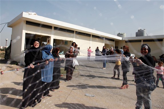 Syrian refugee women in northern Lebanon. Image by UK Department for International Development via Wikimedia Commons.