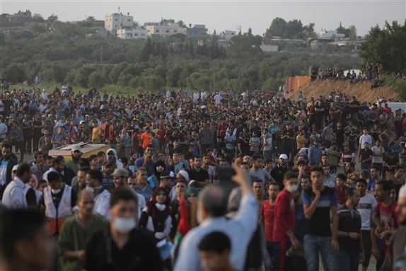 Palestinians take part in a 