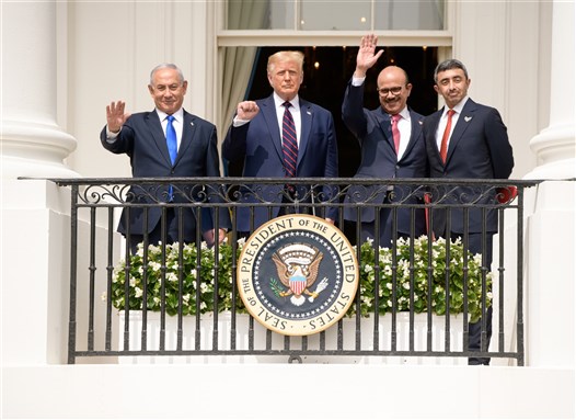 Benjamin Netanyahu, Donald Trump, Abdullatif bin Rashid Al Zayani, and Abdullah bin Zayed Al Nahyan attend the Abraham Accords ceremony in The White House (Washington DC, USA - September 15, 2020). Photo by noamgalai via Shutterstock.