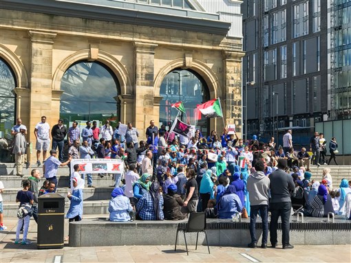 Liverpool, Merseyside / United Kingdom - June 30th 2019: Justice for Sudan, Al Bashir must go protest next to Lime Street Train Station, Liverpool via Shutterstock