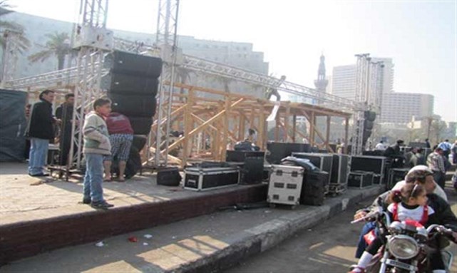 [A stage being set up in the Square in preparation for the New Year`s Eve concert. Image from Ahram Online]