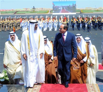 [President Abdel Fattah al-Sisi and Abu Dhabi Crown Prince Sheikh Mohammed bin Zayed attend the opening of a new military base in north-west Egypt on July 22 ahead of Egypt`s Revolution Day celebrations. Photo from the official Facebook page of the Egyptian Presidency.]