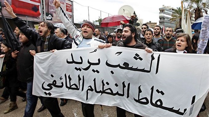 [Protestors in Lebanon, \"The People Demand the Fall of the Sectarian Regime. Image from unknown archive]