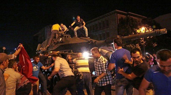 [Turkish protesters stand in the way of a tank in Ankara, 16 July 2016. Image by Headlines View, via Flickr] 