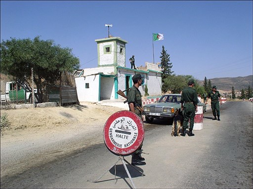 [Algerian border guards man the post in Maghnia. Citizens from both sides regularly cross for business and pleasure. Image by Nazim Fethi/Magharebia] 