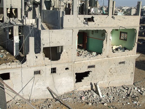 [Aftermath of Israeli bombing in southern Gaza, 2009. Image by Flickr User RafahKid Kid.]