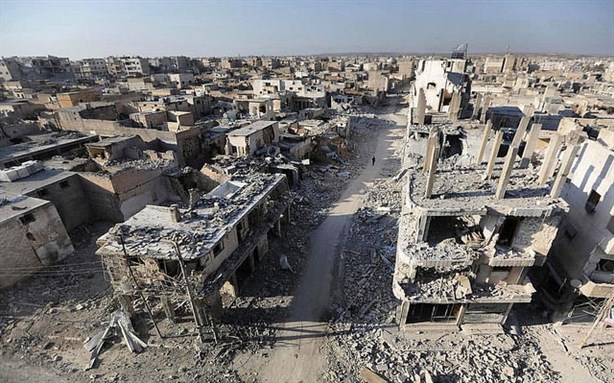 [Image of war torn neighborhood in the Syrian town of al-Bab. Image by Khalil Ashawi via flickr]