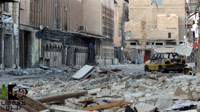 [Rubble of the old post office on Main Street. Deir Ezzor. 7 November 2012. Via Lens of a Young Deri.]