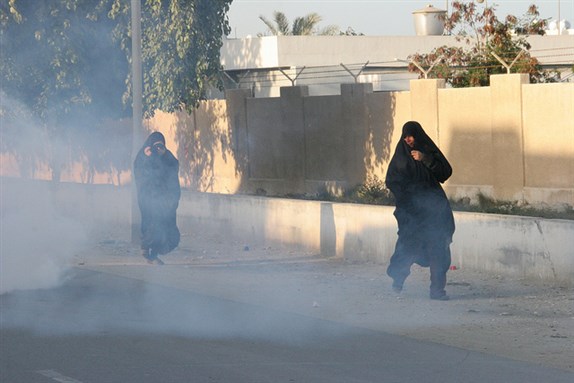 [Bahraini women fleeing teargas attacks during a protest. Image from Flickr/Al Jazeera`s Sara Hassan.]