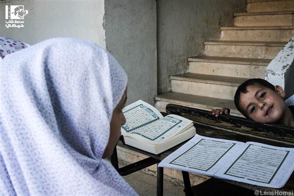 [Displaced Syrians residing in public schools. Al-Wa`ar. 19 September 2012. Via Lens Young Homsi.]