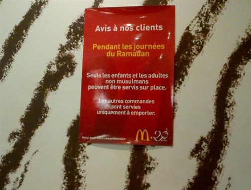 [Image of a sign at the entrance of a McDonald`s in Morocco. Image from Twitter.]