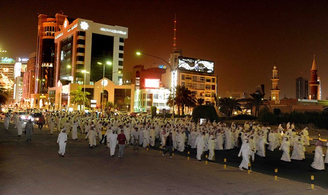 [Kuwaiti members of parliament and their supporters protest on 20 May 2011. Image from Flickr/Kuwait-Ra`ed Qutena.]