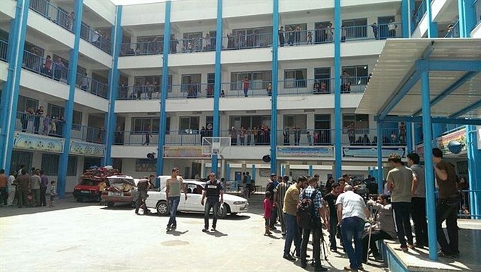 [An elementary school in Gaza’s Rimal neighborhood, where UNRWA is housing refugees who left their homes on orders from the Israeli military on the night between 12 and 13 July 2014. Image by Sean Hoyland.]