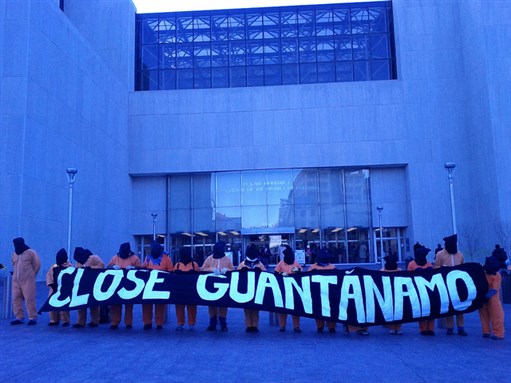 [Demonstrators outside Superior Court in Washington, DC wait for a \"Close Guantanamo\" trial to begin. Jan 3, 2012. Image by Mike Benedetti, via Flickr.]
