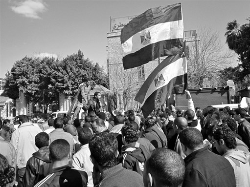 [27 January 2012, march from Giza to Tahrir Sqaure. Photo by Gigi Ibrahim via Flickr]