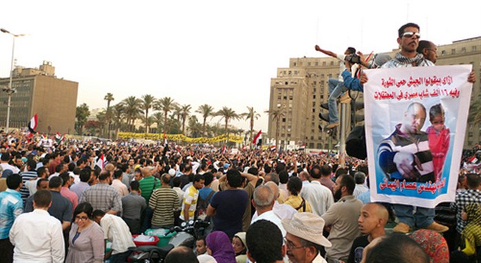 [Egyptian protesters in Tahrir Square speaking against Mubarak-verdicts and military rule. Image originally posted to Flickr by Lorenz Khazaleh.]
