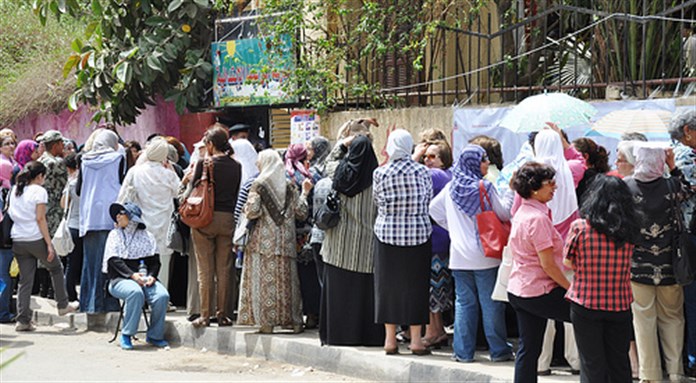 [A long line of Egyptian women voting. Image originally posted to Flickr by UN Women Arab States.]