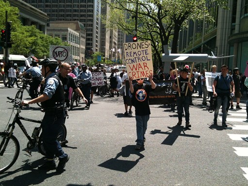 [A protest in Chicago, IL for drone strike victims, May 17, 2012. Image by Debra Sweet.]