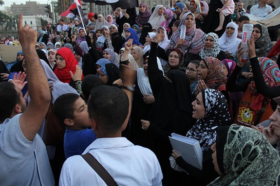 [Egyptians in Tahrir Square, Cairo. Image originally posted to Flickr by Gigi Ibrahim.]