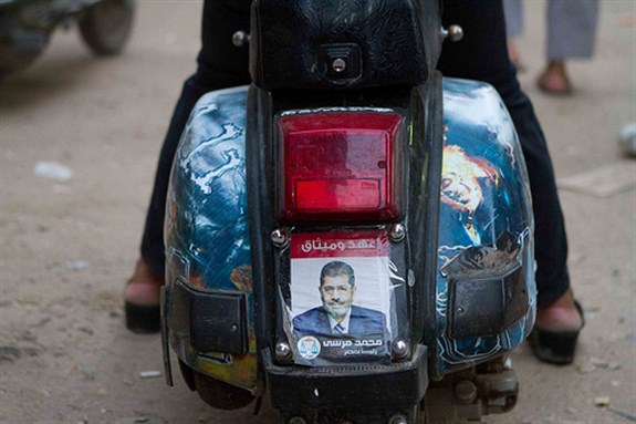 [Election sticker on scooter in Hawamdiya in Giza on 18 June 2012. Image by Sabri Khaled via Flickr.]