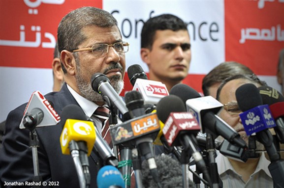 [Muslim Brother`s candidate Mohamed Morsi faced SCAF/Mubarak`s candidate Ahmed Shafik. Image originally posted to Flickr by Johnathan Rashad.]
