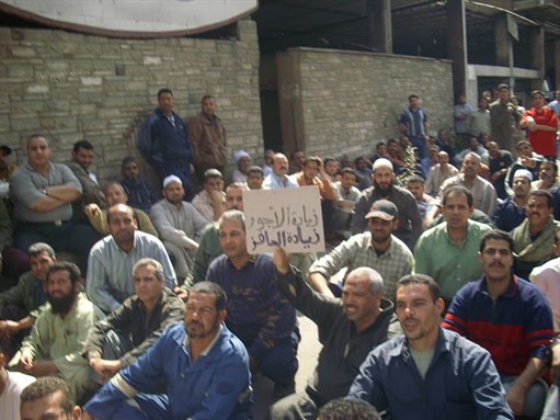 [Workers sit-in at El-Hawamdiya Sugar Refinery in April, 2011, Image Source: Hossam El-Hamalawy, www.arabawy.org]