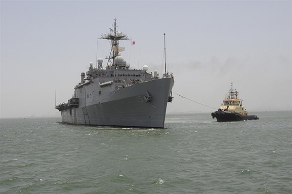 [USS Ponce, part of the US 5th Fleet, pulls into Kingdom of Bahrain. Image from Flickr/Official US Navy Imagery.]