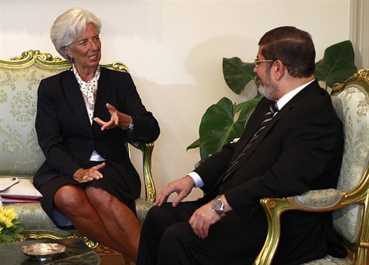 [IMF Managing Director Christine Lagarde met with Egypt`s President Mohamed Morsi at the presidential palace in Cairo on August 22, 2012. Image originally posted to Flickr by Amr Abdallah.]