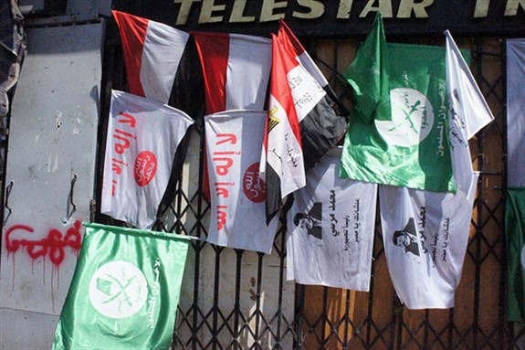 [Flags and banners from the protest in Cairo. Image originally posted to Flickr by Zeinab Mohamed.]