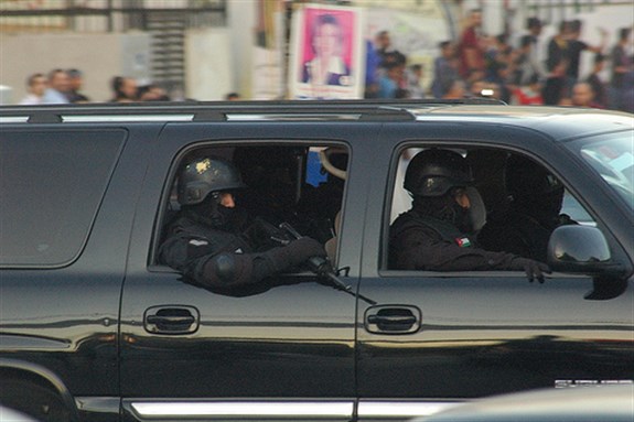 [Riot police on election day. Image from 7iber.com]