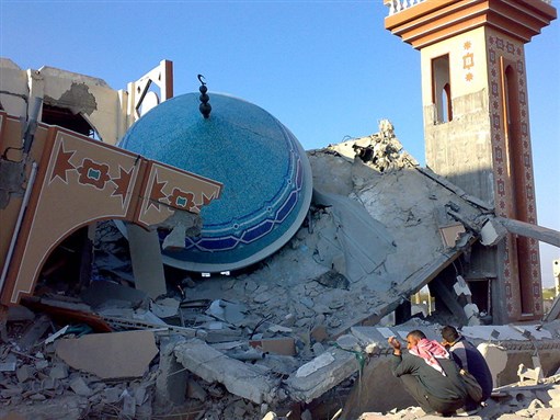 [Image of Mosque destroyed by Israeli bombing in Operation Cast Lead. Image by ISM Palestine. From Wikimedia Commons.]