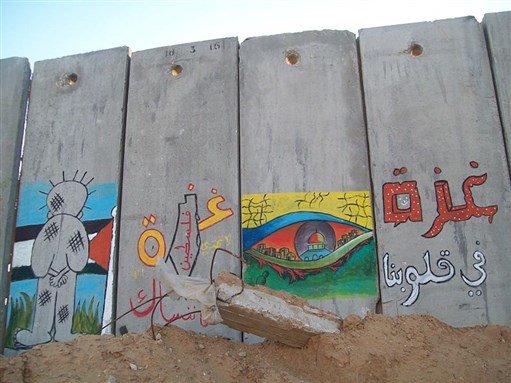 [Gaza -- Graffiti on the Separation Wall in Palestine. Image by ISM Palestine. From Wikimedia Commons.]