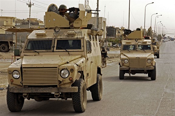 [Iraqi Army on a patrol in Mosul, 2008. Image by Jason Robertson.]