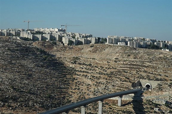 [Tunnel and bridge leading from the Jerusalem suburb of Gilo to the West Bank settlements of the Etzion bloc. Image by Justin McIntosh via Wikimedia Commons.]