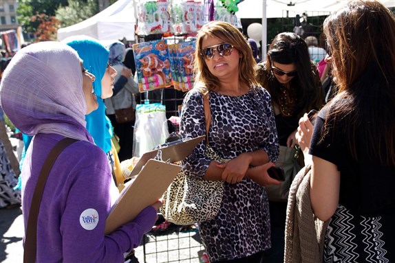 "At the Muslim Day Parade" by Raed Rafei. Photo via Creative Commons.