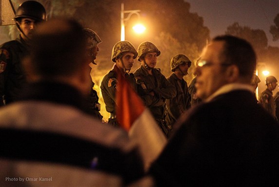[Protesters surrounded the Presidential Palace to protest the Constitutional Referendum put forth by President Morsi. Image originally posted to Flickr by \"Zadokite.\"