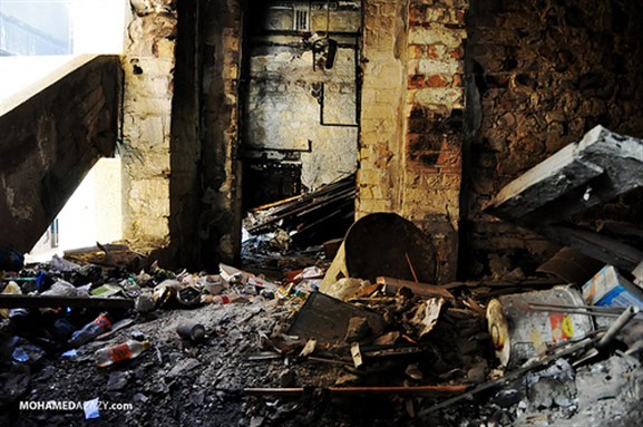 [A burned school near Tahrir clashes. Image originally posted to Flickr by Mohamed Azazy.]